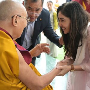 Pooja Chopra Instagram - I once watched ‘Seven Years in Tibet’ and whispered a wish.. to one day meet His Holiness the Dalai Lama.
Years passed, And a wish once whispered found its way to me… today! 

Today, I met His Holiness the Dalai Lama.

With trembling hands and a full heart, I received something otherworldly.. Unable to put in words how i feel but it’s 
A moment I will carry with me forever… 
Thank you so much @nyimarinchen5 & @druks_7 for making this happen 💛 
 #grateful #hisholinessthedalailama #gratitude #blessings