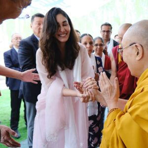 Pooja Chopra Instagram - I once watched ‘Seven Years in Tibet’ and whispered a wish.. to one day meet His Holiness the Dalai Lama.
Years passed, And a wish once whispered found its way to me… today! 

Today, I met His Holiness the Dalai Lama.

With trembling hands and a full heart, I received something otherworldly.. Unable to put in words how i feel but it’s 
A moment I will carry with me forever… 
Thank you so much @nyimarinchen5 & @druks_7 for making this happen 💛 
 #grateful #hisholinessthedalailama #gratitude #blessings