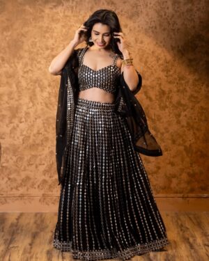 Priya Ahuja Instagram - 🖤✨

Videographer: @photo_vinayak 
Outfit: @indya 
Make up : @makeoverbydipika 
Studio : @studio__1965 

( outfit , black lehnga , glamorous, traditional, festival wear festive look )