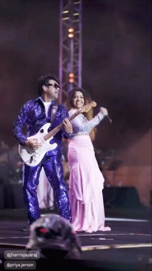 Priya Jerson Instagram - Still can’t believe I got to groove on stage with the one and only Rockstar Harris Jayaraj @jharrisjayaraj sir to his iconic “Adiye Kolludhey” song from my fav Vaaranam Aayiram! Dream moment and im on cloud nine🤩🔥🫶🏽🧿
@ashwinthclicker 📸 thanks for this dream clip🤩
P.s : Audio in this is mixed with real song😅🙏🏽
👗 : @vas_fancy_collection @sangeetha_sen_ @janakesivapalanimuthu thanks for this beautiful dress🙈🫶🏽
@noiseandgrains #rockonharris3