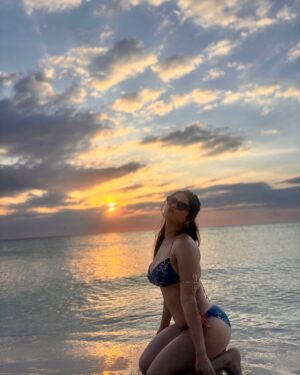 Priyanka Chaturvedi Instagram - Found this secluded beach with literally only one more person around and witnessed the most beautiful sunset of my life, isn’t this what life is all about? :p
@anantg0swami trying his best to make me an island girl 🧜♀️ 🏖️ 🩵🪸🐚