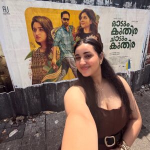 Revathi Pillai Instagram - 10 days to go for odum kuthira chadum kuthira!!🐎🥭
Firsts are always special. Here’s mine- my first Malayalam film’s poster that I spotted in the city. Called my family to show them, saw the biggest smile on their faces which made it even better. 10 years ago, I wouldn’t even have imagined something even close to this happening. Very grateful and happy and nervous for this one. And that said, I’ll see you at the movies on 29th August. 
(Pinch me).🦋💛