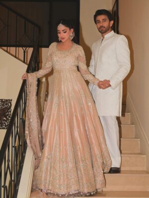 Saboor Aly Instagram - Dressed for the season, glowing together @saadbinshahzad_official & @bemenofficial_ 🕊️

📸 @omgmoods 
💄 @faizas.salon 
💎 @zevargram 
🫶🏻 @iamwaleednadeem