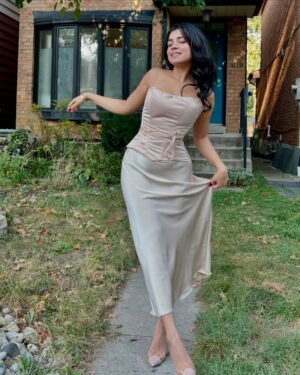 Sakshi Choudhary Instagram - When two separates accidentally become the perfect pair—this top and skirt just turned into my favorite dress!
Top @perfectcorset_nyc
Skirt @zara
.
.
.
.
#torontoinfluencer #theperfectcorset #corsetdress #browngirlbloggers
