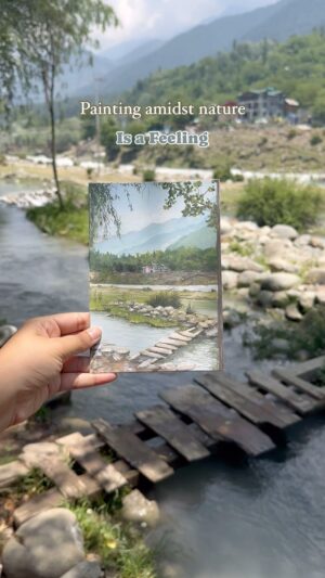 Sakshi Khullar Instagram - Mountains , riverside , my paints and brushes is all I need to remain sane 🏔️🤍 Nature hits different 🌸
#sakshikhullarart #gouachepaint #pleinairpainting
