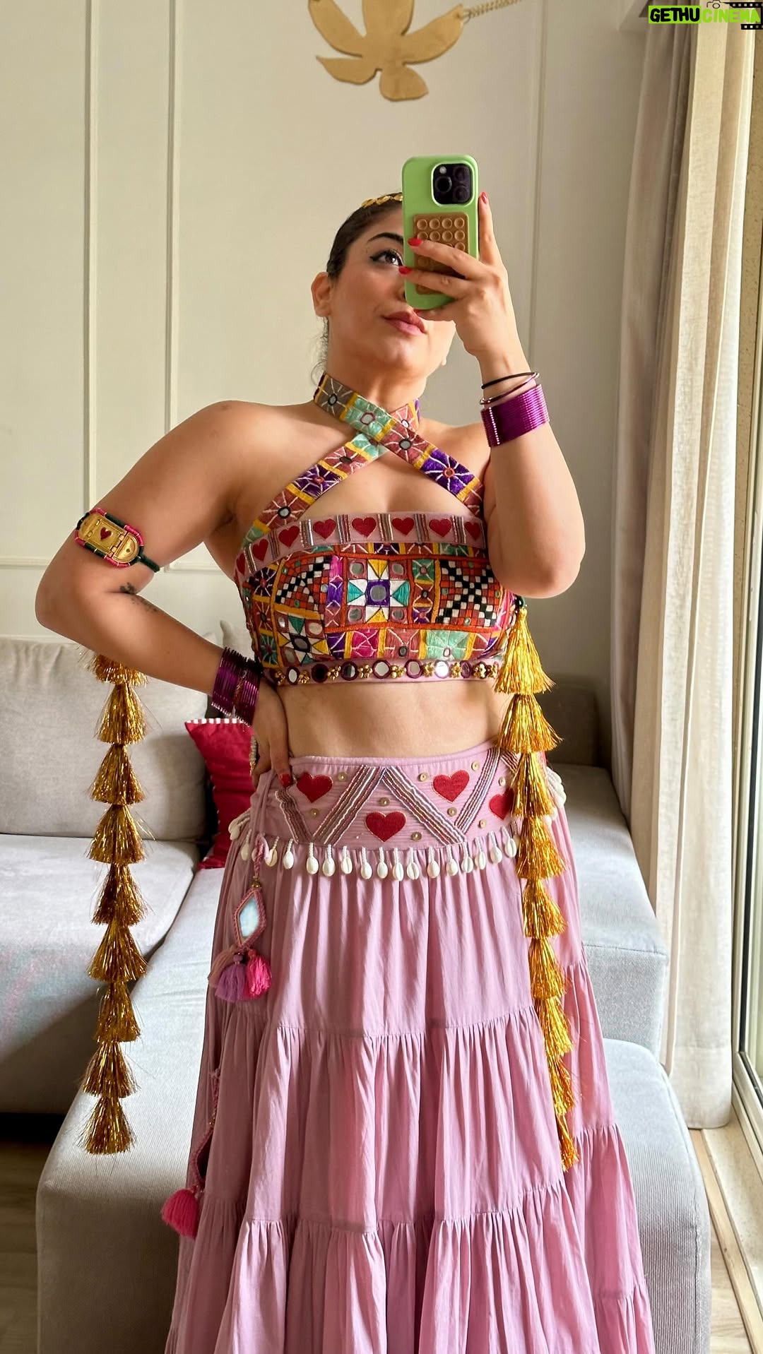 Sakshi sharma - 4.8K Likes - Main toh chali ❤️🩷.. 
ghagra choli @_jd_couture @braanding_b 
Accessories my main star of this look @shopziddi 
Juttis @fizzygoblet 
Hair @reenaduttahairstylist 
#styledwithgumani 
Styling assisted by @divya_sanjay8 
#save Karlo for a Hatke garba look . 
Waise ek baat batao how many hearts can you see in the look ?