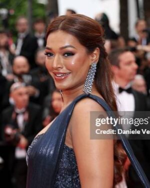 Sarah Sarosh Instagram - stardust on my skin, dreams in my stride✨
•
My red carpet moment at @festivaldecannes with @brut.india for the premiere of the movie Eddington 🎞️
•
•
For my outfit I wanted something inspired by the galaxies 🌌 & take a bold twist on the traditional silhouette of a saree✨ I also only wanted to work with Indian Labels representing India on the global level in every way.
It’s iconic that I worked with @kalkifashion for my first red carpet moment as my first ever saree wore abroad was also by them🥹
We worked together for 2 months straight to bring this vision to life & I felt like my most bold, beautiful self on the carpet🎶
•
What an honour to be at the premiere and share the same carpet & theatre as Emma stone, Joaquin Phoenix, Angelina Jolie & so many icons 😍
•
•
•
•
#cannes2025 #Eddingtonpremiere #SarahinCannes #CannesFilmFestival