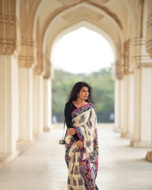Saranya Pradeep Instagram - A step, a story, a sigh 🤎

📸 : @pallesunny 
Assisted by : @nani____08_ 

Hairstylist : @farzanashaik._.stylist 

#saree #story #rootedinculture #history #traditions #twist #sareelove #goldenhourphotography #photooftheday #naturevibes #wind #whisper #breeze #and #bliss #ig #insta #sunset #dreams #rustic #charm #sixyardsofgrace #timelesselegance #beauty #lostinthemoment #serenity #heritage #❤️❤️