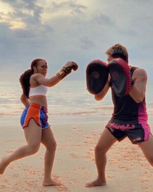 Shaina West Instagram - oooowweeee (in a romantic way) @combat.collective 

sunset Muay Thai on the beach was a beautiful way to end the day here in Phuket 😍🥊 

BTS and more training content on FanFix — link in bio!