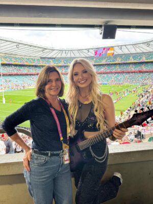 Sophie Lloyd Instagram - Seriously can’t get over how incredible yesterday was 🥹 getting to open up the Women’s Rugby World Cup final to 82,000 people was one of the proudest moments of my life. It felt like such an empowering day for women everywhere and I’m so honoured to have played a part in it. Congratulations to all the players for helping shape history and an extra special congrats to @redrosesrugby for bringing home the cup 🏆🌹

#womensrugby #redroses #rugby #RWC2025 #rwc2025final #guitarist #rugbyworldcup #englandrugby