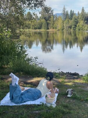 Tanvir Gill Instagram - favourite summer activity 🌼

Soaking in the last days of summer. Favourite activity this summer has been exploring local lakes in my home town. Found the cutest gems this summer. Can’t wait to do it all over again next summer & I know wasn’t the smartest to wear white socks to a lake 🫠

#summer #pintrestinspired #lakesideview #picnicdate #picnicoutfit