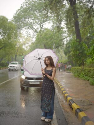 Tanya Singh Instagram - The best kind of therapy: soft rain and a free heart💙 ☔️ 🌻🫶🏻❤️