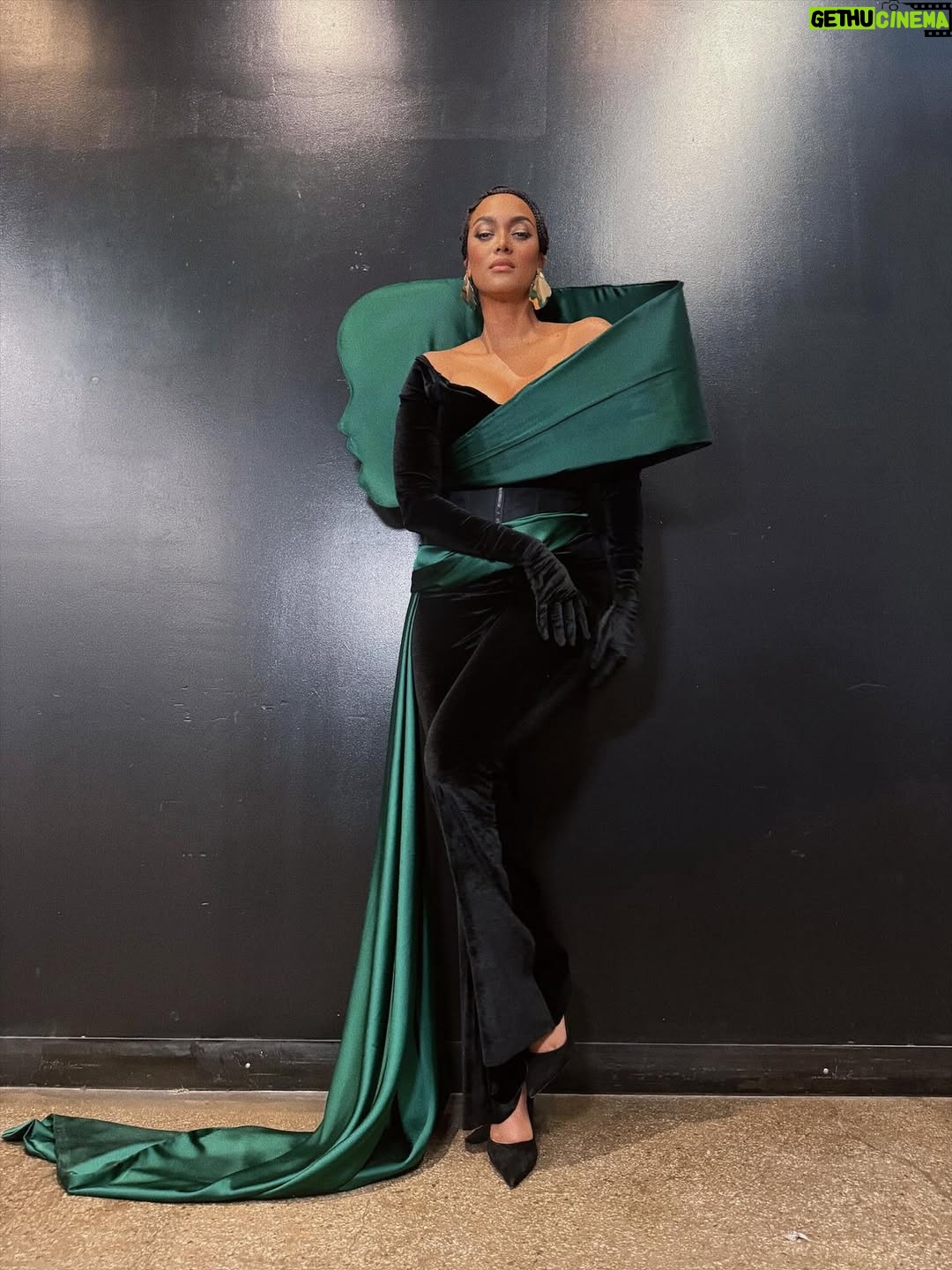 Tyra Banks - 27.2K Likes - My girl @heidiklum called and I said, “I’ll be there”. @projectrunway team said “dress @wickedmovie avant-garde”, so we went there. Lawd, we WENT there. #Elphaba on my shoulder!!! Ha! TyTy’s outfit is def #defyinggravity. 

Stylist: @wilfordlenov 
The 💚 look: @bishme_cromartie 
Hair: @kiyahwright1 
Makeup: @valentefrazierartistry

@Freeform @Hulu  @DisneyPlus