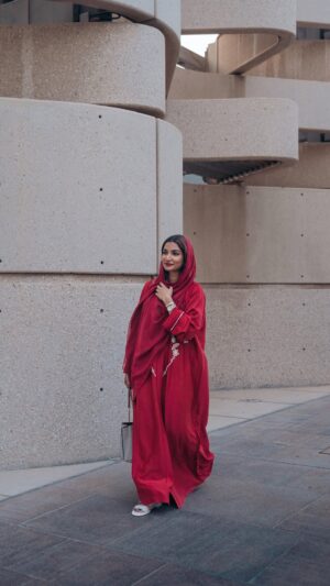 Unaisa Subair Instagram - Strolling through the vibrant streets of Doha in my stunning red abaya – embracing the rich culture and beauty of Qatar. 🌆🔴 #DohaDiaries #CultureInColor