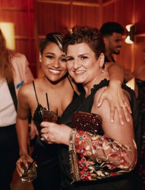 Ariana DeBose Instagram - At 10:28 am on August 17th my gorgeous, hilarious, outspoken, warrior queen Mother - Gina Michelle DeBose - passed away due to complications with stage 3 ovarian cancer. I couldn’t be more proud of her and how she fought this insidious disease over the past 3 years. She was 57 years young. 

She was my favorite person, my biggest fan and toughest critic. My best friend. She was my date to every important moment in my professional and personal life - and I wouldn’t have it any other way. It had always been the two of us for as long as I can remember. Through lean times, and there were many of those & green times. She fought like hell to give me a good life, a good education and every opportunity in the world. I wouldn’t be where I am without her. I meant it when I said my Oscar “is just as much hers as it is mine.” 

My mom loved to paint, play cards, listen to good music & snuggle with her cats; but her life’s purpose, aside from being my mom, was educating young people. She passed just shy of delivering 30 years of service as a public school teacher (most currently 8th grade social studies). And, my god, did she thrive in a classroom. Her creativity knew no bounds. She was beloved and incredibly respected by her colleagues and students alike. The greatest advocate for the underdog, a believer in arts education and the smartest person I know - with a willingness to speak her mind regardless of the consequences. But she was also a heart forward individual who believed in hard work, compassion and empathy in the same breath. 

I know that many people in her community will feel the loss of her deeply for she was her own brand of local celebrity. She was a force of epic proportion. 

For the record: my greatest and most proud achievement will always be to have made her proud. 

I love you mommy. Now travel amongst the seas, the winds and the angels as I know you always loved to do. 

See slide 2 for details on where to donate in honor of her memory🕊️🌻🌻🌻🌻