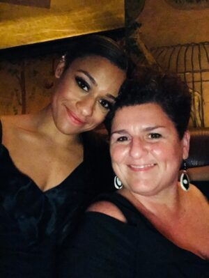 Ariana DeBose Instagram - At 10:28 am on August 17th my gorgeous, hilarious, outspoken, warrior queen Mother - Gina Michelle DeBose - passed away due to complications with stage 3 ovarian cancer. I couldn’t be more proud of her and how she fought this insidious disease over the past 3 years. She was 57 years young. 

She was my favorite person, my biggest fan and toughest critic. My best friend. She was my date to every important moment in my professional and personal life - and I wouldn’t have it any other way. It had always been the two of us for as long as I can remember. Through lean times, and there were many of those & green times. She fought like hell to give me a good life, a good education and every opportunity in the world. I wouldn’t be where I am without her. I meant it when I said my Oscar “is just as much hers as it is mine.” 

My mom loved to paint, play cards, listen to good music & snuggle with her cats; but her life’s purpose, aside from being my mom, was educating young people. She passed just shy of delivering 30 years of service as a public school teacher (most currently 8th grade social studies). And, my god, did she thrive in a classroom. Her creativity knew no bounds. She was beloved and incredibly respected by her colleagues and students alike. The greatest advocate for the underdog, a believer in arts education and the smartest person I know - with a willingness to speak her mind regardless of the consequences. But she was also a heart forward individual who believed in hard work, compassion and empathy in the same breath. 

I know that many people in her community will feel the loss of her deeply for she was her own brand of local celebrity. She was a force of epic proportion. 

For the record: my greatest and most proud achievement will always be to have made her proud. 

I love you mommy. Now travel amongst the seas, the winds and the angels as I know you always loved to do. 

See slide 2 for details on where to donate in honor of her memory🕊️🌻🌻🌻🌻