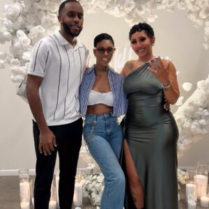 Brittney Bee Starr Williams Instagram - Just want to say thank you for all the love the comments , my friends, my family ☺️☺️ I’m still in shock ❤️❤️💍💍 #engaged  shop @eleven22_online