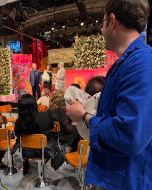 Cecily Strong Instagram - Best first Mother’s Day ever. Bébé Strong MacG got to meet so many of the people I love so so much, including Colin Jessica Jost who wore a parka for their first meeting 😜. On the way over I said “I bet Gena is gonna cry” and we ran into my dear friend and longtime stage manager Gena right away as we walked in and we all proceeded to cry together immediately.  Sarah kept hugging Celeste because she couldn’t hug the baby yet. Auntie Erin came by to say hello. We met Lorne who said she’s the future of television (jkjkjk). New genius Jane wrote a baby shoe sketch! Tucker wrote some more amazing jokes for Judge Jeaniney Beany that I got to yell next to the brilliant JAJ as Trump. And to top it off, lil girl was dressed in a fabulous pink dress which was a gift from Marcello and his gorgeous glam queen mother! I’ve been lucky enough to have some beautiful Mother’s Days at SNL with my own mama (including one show hosted by the mother of unintentional baby tees and intentional Nazi Salutes herself, Ms. Elon Musk) but this one takes the cake. I hope bb thinks it’s cool up until she’s 13/14/15/16 when she probably thinks I’m an embarrassing biotch, and then cool again from 17 onward ❤️ Love you babygirl and love you Snl ❤️❤️❤️
