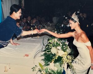 Cindy Sirinya Bishop Instagram - It has been the honor of my lifetime to have served Her Majesty Queen Sirikit, The Queen Mother — a woman of unparalleled grace, vision, and devotion to her people. 

Her Majesty’s love for Thai silk not only revived a treasured national art form but also restored livelihoods, pride, and purpose to thousands of Thai families across the country. In 1976, she established the SUPPORT Foundation to provide supplementary occupations for farmers facing unstable incomes due to changing rainfall and climate conditions. By encouraging traditional craftsmanship and local wisdom, she  helped transform humble village weaving into a globally celebrated craft ~ instilling hope in communities that continue to thrive to this day.

One of my fondest memories was modeling the exquisite creations of Thailand’s top designers for Her Majesty’s fashion showcases. I’ll never forget walking the runway outdoors, where the very villagers who wove the silk I was wearing watched with pride and delight. It was a beautiful full-circle moment to witness their craftsmanship being celebrated on a stage that honored them in return.

Her Majesty’s elegance, compassion, and radiant smile touched the hearts of everyone who had the privilege to be in her presence. Her legacy continues to shine in every thread of Thai silk — a symbol of artistry, resilience, and love for our people and culture. 💙

#QueenSirikit #ThaiSilk #LegacyOfLove #ThaiCraftsmanship #PrideOfThailand #CulturalHeritage