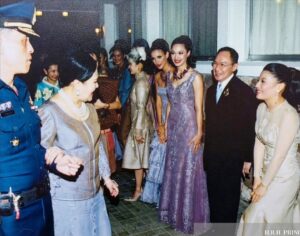 Cindy Sirinya Bishop Instagram - It has been the honor of my lifetime to have served Her Majesty Queen Sirikit, The Queen Mother — a woman of unparalleled grace, vision, and devotion to her people. 

Her Majesty’s love for Thai silk not only revived a treasured national art form but also restored livelihoods, pride, and purpose to thousands of Thai families across the country. In 1976, she established the SUPPORT Foundation to provide supplementary occupations for farmers facing unstable incomes due to changing rainfall and climate conditions. By encouraging traditional craftsmanship and local wisdom, she  helped transform humble village weaving into a globally celebrated craft ~ instilling hope in communities that continue to thrive to this day.

One of my fondest memories was modeling the exquisite creations of Thailand’s top designers for Her Majesty’s fashion showcases. I’ll never forget walking the runway outdoors, where the very villagers who wove the silk I was wearing watched with pride and delight. It was a beautiful full-circle moment to witness their craftsmanship being celebrated on a stage that honored them in return.

Her Majesty’s elegance, compassion, and radiant smile touched the hearts of everyone who had the privilege to be in her presence. Her legacy continues to shine in every thread of Thai silk — a symbol of artistry, resilience, and love for our people and culture. 💙

#QueenSirikit #ThaiSilk #LegacyOfLove #ThaiCraftsmanship #PrideOfThailand #CulturalHeritage