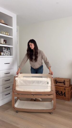 Emily Canham Instagram - I think I’m nesting 🤭

p.s thank you for all of your recommendations! I was overwhelmed with snuzpod recs soooo here it is! This is the new Snüzpod 5 in Walnut😌🍼