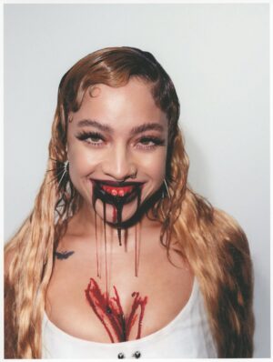 Kiana Ledé Instagram - Happy anniversary Cut Ties 😭✂️🩸🤍💋 This was our first independent release so I wanted to make sure I put my back into this creative vision to match to effort we put into tellin my story in the music. For this album I wanted my love of horror and gory things to represent the times love and all types of relationships have become a lil twisted and painful when I held onto them for too long. Since then I have gotten REALLY good at cuttin chords and I hope I helped you too 🤍
Thank you so much to my team and the other artist and creatives that helped me string this together. 
Thank you guys for listenin, thank you for carin, and thank you for supportin me as I go through this journey as an independent artist🤍🤍
✂️🩸🤍

P.s. no men were physically harmed durin this shoot