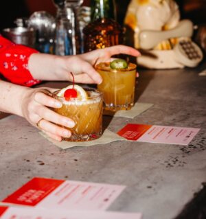 Mamrie Hart Instagram - We didn’t just kick off this tour. We gave it a round house to the teeth! 🍹 Perfect night of cocktails and laughs and THIS SKIRT to celebrate ALL I THINK ABOUT IS FOOD. ✨ 

HUGEST thanks to @rouxportland for putting this whole shindig together. I love y’all 😭 Thank you to my fav bar in Portland @dearsandypdx for hosting! @katesicecream for serving perfect scoops 🍨 And @goldfinchcollective for being so CHARMing and @braaschley for being a booze goddess 

📸 All photos by genius @yeticorn_