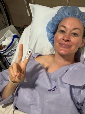 Mamrie Hart Instagram - Ya girl’s FIRST surgery 👀 Today, I got both a Salpingo-Oophorectomy and a Cone Biospy AKA I got a 10cm cyst and my right ovary/tube removed as well as some abnormal cells taken out of my cervix. YOUCH! 

Telling you this because while I don’t want kids, this would be really tough for someone who did and would definitely make getting pregnant more difficult.. So don’t be like me,a redneck who will avoid the doctor till something falls off. Go get those Pap smears! Get those  mammograms! 

If you need me for the next few days… I will be healing, having my darling Chip bring me food in bed, and refusing to take off this fall risk bracelet. 

💥 Shout out to Cedars-Senai and Dr Andrew Li who made this really scary thing way less scary. ❤️