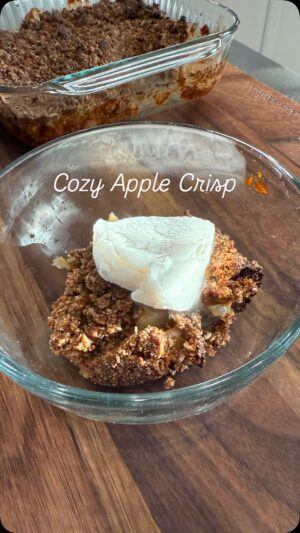 Michelle Madrigal Instagram - Cozy Fall Apple Crisp 🍏

Filling
	•	3 apples, peeled & cubed (I used green & red)
	•	1 tbsp apple cider vinegar (or lemon juice)
	•	A few tbsp water
	•	1 tsp cinnamon
	•	¼ tsp nutmeg
	•	3–4 tbsp maple syrup
	•	1 tbsp butter or ghee (I used non dairy butter)
	•	Pinch of sea salt

Crisp/Crumble 
	•	⅓ cup almond flour
	•	⅓ cup all-purpose flour (use gluten-free if you like)
	•	⅓ cup rolled oats (gluten free)
	•	½ cup brown sugar (I used coconut sugar)
	•	⅓ cup melted coconut oil (or butter)
	•	A handful of walnuts or pecans, chopped
	•	1 tsp cinnamon
	•	Pinch of cardamom/nutmeg/pumpkin spice
	•	Salt to taste

Directions
	1.	Heat oven to 400°F.
	2.	In a skillet, combine apples, vinegar, and water. Cover and let simmer on low until apples soften.
	3.	In a separate bowl, mix all crisp topping ingredients. You can use a blender for a quick pulse or just stir by hand if you like it chunky.
	4.	When apples are soft, stir in maple syrup and butter. Let simmer gently, stirring occasionally, until it thickens into a paste.
	5.	Transfer the apple mixture to a small oven-safe dish. Spread the crisp topping evenly over the apples.
	6.	Bake for about 20 minutes, or until the top is golden and crunchy.
	7.	Let it cool slightly, then enjoy on its own or with a scoop of vanilla ice cream.