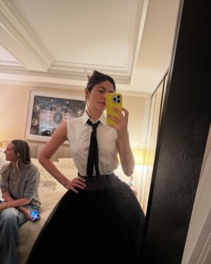 Monica Barbaro Instagram - bts from a week ago! staircases, iced coffees and corsets… truly takes a village (or staircase full) of people to pull these things off… and this isn’t even close to everyone who was involved…