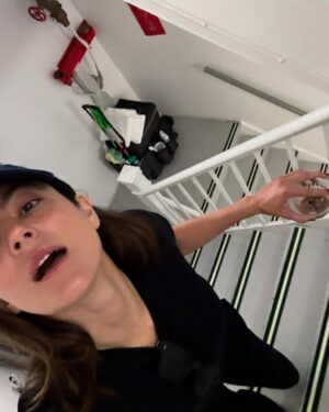 Monica Barbaro Instagram - bts from a week ago! staircases, iced coffees and corsets… truly takes a village (or staircase full) of people to pull these things off… and this isn’t even close to everyone who was involved…