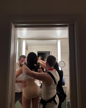 Monica Barbaro Instagram - bts from a week ago! staircases, iced coffees and corsets… truly takes a village (or staircase full) of people to pull these things off… and this isn’t even close to everyone who was involved…