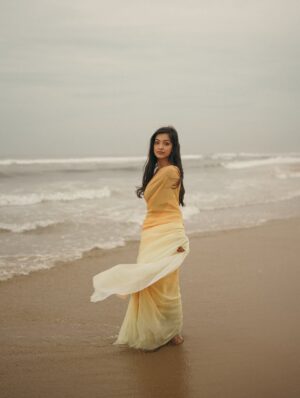 Shravnitha Srikanth Instagram - Footprints in the sand…

Photography @its_surean 

#shoot #shooting #potrait #potraitshoot #beach #yellowsaree