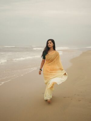 Shravnitha Srikanth Instagram - Footprints in the sand…

Photography @its_surean 

#shoot #shooting #potrait #potraitshoot #beach #yellowsaree