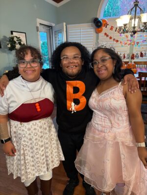 Stephanie Mills Instagram - Halloween is my son’s absolute favorite holiday #FARADJMILLS- This year my baby was all smiles. Correction, my young man, was a “BAD BOY” 😂😂😂😂. I can’t remember the last time his heart glowed so much. His friend Aliza was so beautiful as his queen, and Lauren was a joy as always. Yes, we had to take a photo with lil “Ms. Wednesday”, she was so adorable. I hope you all enjoyed your evening and know that your nephew had the time of his life. #POWER 🧡🖤 🧡🖤 🧡🖤 🧡🖤