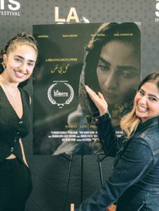 Anousha Instagram - .🎥🎬🎞️
Our film premiered at LA Shorts after nearly two years of dreaming, filming, and bringing it to life. To anyone in the film industry: this process takes time. It’s rarely easy, but storytelling is sacred. Since the beginning of humanity, stories have helped us make sense of life. They give us hope, remind us we’re not alone, and inspire us to keep going.
Your story matters. There’s space for it. This world is abundant, we need more voices, more visions, more truth.
Thank you to the cast and crew for creating such a safe, beautiful space for us to be vulnerable. Playing Mina was an honor. She’s fierce, raw, and deeply rooted in justice, and I carry her with me still.
To our brilliant director, @sahar_ghorishi.x ,thank you for pouring your soul into this. The silence in the theater, the tears in the room, you created that. And to my family and my partner: thank you for believing in me, always.
______________________________________________
فیلم ما بعد از نزدیک به دو سال تلاش، فیلم‌برداری و ساخت، در جشنواره‌ی LA Shorts اکران شد.
برای همه‌ی عزیزانی که در صنعت فیلم فعالیت می‌کنن: این مسیر، زمان‌بره و آسون نیست، اما قصه‌گویی یک کار مقدسه. از آغاز تاریخ بشر، داستان‌ها بودن که به زندگی‌مون معنا دادن. امید بخشیدن، ما رو به هم نزدیک کردن، و باعث شدن ادامه بدیم.
داستان تو مهمه. برای صدا و روایت تو جا هست. این دنیا پر از فراوانیه، ما به صداهای تازه، نگاه‌های نو و حقیقت‌های بیشتر نیاز داریم.
ممنونم از تیم تهيه كننده و عوامل که محیطی امن و زیبا برای حضور مخصوصاً بازیگران ساختن. نقش «مینا» برای من افتخاری بزرگ بود، دختری قوی، واقعی و ریشه‌دار در عدالت که هنوز در وجود من زندگی می‌کنه.
و به کارگردان بی‌نظیرمون، سحر عزیز، ممنونم که تمام قلب و روحت رو پای این فیلم گذاشتی. سکوت سالن، اشک تماشاگرها… همه از لحظه‌هایی بود که تو خلق کردی.
و در آخر، ممنونم از خانواده‌ام , پارتنرم و دوستانم که همیشه به من ایمان داشتن 🫂❤️