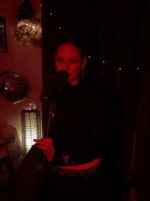 Anzela Abbasi Instagram - I am the wave and the rock that shapes it.
.
Did a gig at @drinkblackhoney ☕️🧋🩶