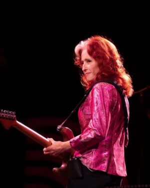 Bonnie Raitt Instagram - While we’re getting a big kick out of the wild AI renderings and outrageous fake stories being circulated by creepy bot accounts on @facebook, we do want to acknowledge that the misinformation about Bonnie’s career, family, politics and philanthropy being spread by these accounts is harmful and misleading. There seems to be an uptick of these posts reaching the algorithm of Bonnie’s audience over the last 48 hours (at least) and we are aware of it and want to clarify a few things:
— There is not a Netflix documentary about Bonnie Raitt in the works.
— Bonnie is not doing a “farewell tour” or releasing a “farewell album.”
— She is not performing at Rockefeller Center in December 2025.
— Her brother was not a victim of the tragic UPS plane crash in Louisville on November 4, 2025.
— Bonnie is not in a Twitter spat with White House Press Secretary Karoline Leavitt or making posts about immigration policy and the like.
— Bonnie Raitt and @jacksonbrowne have not been asked to perform at TPUSA’s “The All-American Halftime Show.”
When there is new information about Bonnie’s music and touring activity that she wants to share with the world, that information will be posted on her official website www.bonnieraitt.com and her official social media channels that carry the blue verified check mark next to her name. Please do not engage with the posts being made by those deceitful accounts masquerading as genuine as that only encourages them to spread more misinformation. Please don’t ever be faked into believing that Bonnie Raitt is in your Direct Messages chatting with you one-one-one personally. Here are Bonnie’s official social channels which will be the only location you’ll see information truly coming from her and her team. We thank you for weathering this AI storm with us! — BRHQ
Facebook: @officialbonnieraitt
Instagram: @bonnieraittofficial
Twitter / X: @TheBonnieRaitt
TikTok: @bonnieraittofficial
Bluesky: @bonnieraitt.bsky.social
YouTube: @TheBonnieRaitt
Photo by Hans Tak/Courtesy of @hollandbluesfest (June 20, 2025)