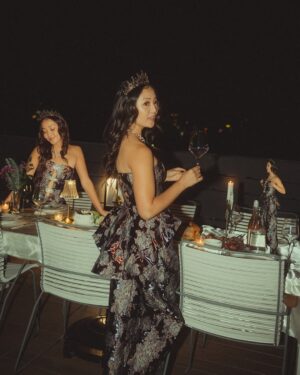 Chelsea Zhang Instagram - 𝓌𝒾𝓉𝒽 𝒻𝓇𝒾𝑒𝓃𝒹𝓈 𝒶𝓇𝑜𝓊𝓃𝒹 𝓉𝒽𝑒 𝓉𝒶𝒷𝓁𝑒 ✨ 

My lil slice of heaven 💛 @third.spacela is my events & hosting page ✨

Celebrated another year with a Baroque Themed Rooftop Dinner— very inspired by my outfit (@shopakira ) and the queens I’m surrounded by in this beautifully complex city ✨ 

The miracle of relationships never fails to amaze me — Each friend a story of divine design. Couldn’t have planned the seats at my table if I tried and i wouldn’t want it any other way ❤️ 

———————-

I love a full event experience — I delight in excellence and details… but also catch me at 6pm crying because I tried to set up a party by myself 🫠. To be met with friends who fly to the rescue, laugh it off and tell me they would have shown up if it  were just two pieces of bread on an barren table 🤣 — healed a lot in little Chels’s heart. 

Thankful for my friends who help head knowledge become heart knowledge by loving me thru every version of myself (especially troll Chelsea — shes a problem. 🧌🤪) 

I pray that this type of community surrounds you and is never taken for granted ❤️✨ 

#community #girlhood #dinnerparty #hosting #perfectionism #birthday #celebration #rooftop #citylife #adulting #adultfriendships #oliviadean #artofloving