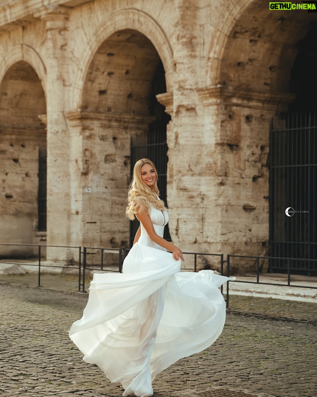 Cindy Marina - 10.4K Likes - A Roman dream 🤍✨ 

Shot by the talented @lunapictures.al 
Dress by amazing @aiahmariage 
Makeup by bestie @henrigjata_mua 
Hair by my baby @florii_hairstyle