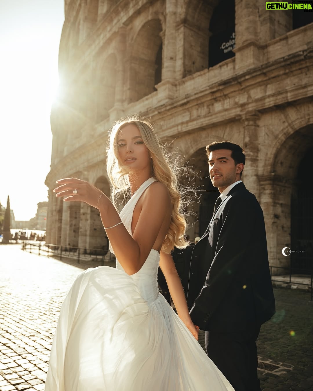 Cindy Marina - 10.4K Likes - A Roman dream 🤍✨ 

Shot by the talented @lunapictures.al 
Dress by amazing @aiahmariage 
Makeup by bestie @henrigjata_mua 
Hair by my baby @florii_hairstyle