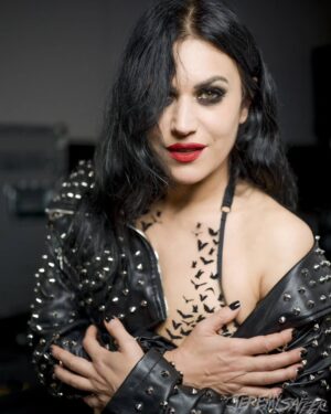 Cristina Scabbia Instagram - Surprise!!! Cristina @cristinascabbia and I have teamed up again and just dropped 4 all new prints for BF/CM and all orders today and tomorrow will come with a Cristina guitar pick! many other signed/unsigned Cristina/Lacuna Coil prints are on sale as well! Cri is absolutely one of my favorite people to work with. so pumped to share these photos as prints. get em while you can!