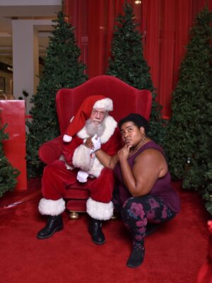 Dulcé Sloan Instagram - Here is the full Santa photo shoot! Merry Christmas yall 🎄🎅🏼🥰 Thank you to the Santa at the Sherman Oaks Westfield mall for my Christmas miracle.