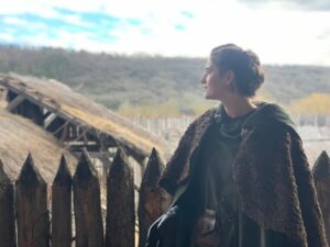 Eliza Butterworth Instagram - The 10 year anniversary of The Last Kingdom!!! ♥️⚔️♥️ Without a doubt this will forever be one of the most joyous, magnificent, magical and absolutely life changing chapters of my existence!! Any of our cast and crew can attest to this and we are connected forever through this beautiful show which was made over 8 years! The best job I will ever have! This show brought me the bestest friends anyone could dream of, the most stunning memories as well as an unbelievable education from all of the exquisite cast and crew in all things acting, filming and production. These people are magic and these photos and videos do no justice to show the years of fun and laughter we had together filming in beautiful Budapest! I started the show at age 21 and ended age 28 as a royal Saxon grandmother having the time of her life! This show allowed all of us actors to expand our range and they believed in us to carry such amazing storylines and relationships which blows my mind! Our crew and production team were exquisite in every way possible and brought every single second of this show to life! And the best part of all of these years of fun is getting to connect with our stunning fans who joined us for the epic ride and made it all possible! We love you so much! Thank you or everything!!! DESTINY IS ALL ♥️🥹♥️