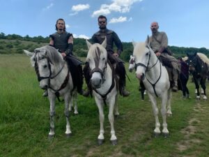 Eliza Butterworth Instagram - The 10 year anniversary of The Last Kingdom!!! ♥️⚔️♥️ Without a doubt this will forever be one of the most joyous, magnificent, magical and absolutely life changing chapters of my existence!! Any of our cast and crew can attest to this and we are connected forever through this beautiful show which was made over 8 years! The best job I will ever have! This show brought me the bestest friends anyone could dream of, the most stunning memories as well as an unbelievable education from all of the exquisite cast and crew in all things acting, filming and production. These people are magic and these photos and videos do no justice to show the years of fun and laughter we had together filming in beautiful Budapest! I started the show at age 21 and ended age 28 as a royal Saxon grandmother having the time of her life! This show allowed all of us actors to expand our range and they believed in us to carry such amazing storylines and relationships which blows my mind! Our crew and production team were exquisite in every way possible and brought every single second of this show to life! And the best part of all of these years of fun is getting to connect with our stunning fans who joined us for the epic ride and made it all possible! We love you so much! Thank you or everything!!! DESTINY IS ALL ♥️🥹♥️