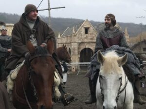 Eliza Butterworth Instagram - The 10 year anniversary of The Last Kingdom!!! ♥️⚔️♥️ Without a doubt this will forever be one of the most joyous, magnificent, magical and absolutely life changing chapters of my existence!! Any of our cast and crew can attest to this and we are connected forever through this beautiful show which was made over 8 years! The best job I will ever have! This show brought me the bestest friends anyone could dream of, the most stunning memories as well as an unbelievable education from all of the exquisite cast and crew in all things acting, filming and production. These people are magic and these photos and videos do no justice to show the years of fun and laughter we had together filming in beautiful Budapest! I started the show at age 21 and ended age 28 as a royal Saxon grandmother having the time of her life! This show allowed all of us actors to expand our range and they believed in us to carry such amazing storylines and relationships which blows my mind! Our crew and production team were exquisite in every way possible and brought every single second of this show to life! And the best part of all of these years of fun is getting to connect with our stunning fans who joined us for the epic ride and made it all possible! We love you so much! Thank you or everything!!! DESTINY IS ALL ♥️🥹♥️