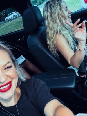 Emme Rylan Instagram - That one time @EmmeRylan and I were taking our daughters to a Disney concert…and traffic had us taking a LOT of selfies in the car…before realizing there was an item in *every* pic that just seemed - out of place? 😂 Swipe to see the third wheel in our car photoshoot.