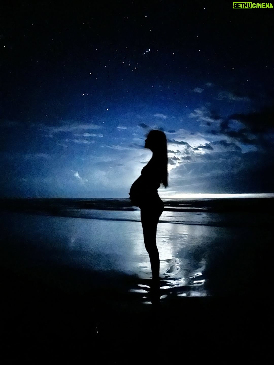 Isabel Lucas - 7.5K Likes - I’ve heard it said that in birth, a mother journeys to the stars to gather the soul of her baby.

I’ve felt our little one summon us too, guiding us gently into their world.

This quiet, wild magic found us on new moon, watching lightning and stars dance over the sea.

🐚