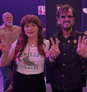 Jenny Lewis Instagram - sometimes when you’re on you get to hang with @ringostarrmusic @bourbonandbeyond !  watched @wherethefuckissturgillsimpson out in the wild with the fellers.  lots of great kicks & accessory shots by my fave @penelopemrtnz  nice seeing @keithharingfoundation Julia out in the wild @meijergardens  took a late night stroll of the gardens with the dudes. 
@matthw.francis famous central park raccoon selfie 
oh, and the @grillospickles swag shirt maiden voyage.  BLESS!