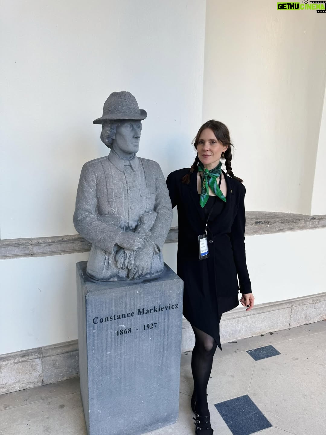 Kate Nash - 4.3K Likes - Here I am with Constance Markievicz the Irish revolutionary nationalist politician, suffragist and socialist & the first woman elected to the Parliament of the United Kingdom, (although she was in prison at the time, what a legend) ☘️ Thank you @padalytd for inviting me to parliament, Leinster House in Dublin, it was truly inspiring. Thanks to @susanoneillmusic & @mickflannerymusic for having me & @boomvision at Vicar Street! To @rionhannora for the visionary garms, to @trawfawdeen for jumping in last minute & playing the fiddle like an absolute angel, to @cobblestonepubdublin & the Mulligans for the session & inviting me up for a tune. And as always to @cornucopia_restaurant for the many vegan scones that I enjoy so much. Happy Christmas everyone. 💚☘️